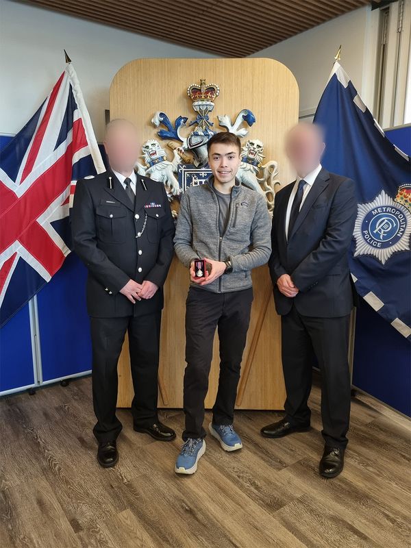 Ben receiving a medal